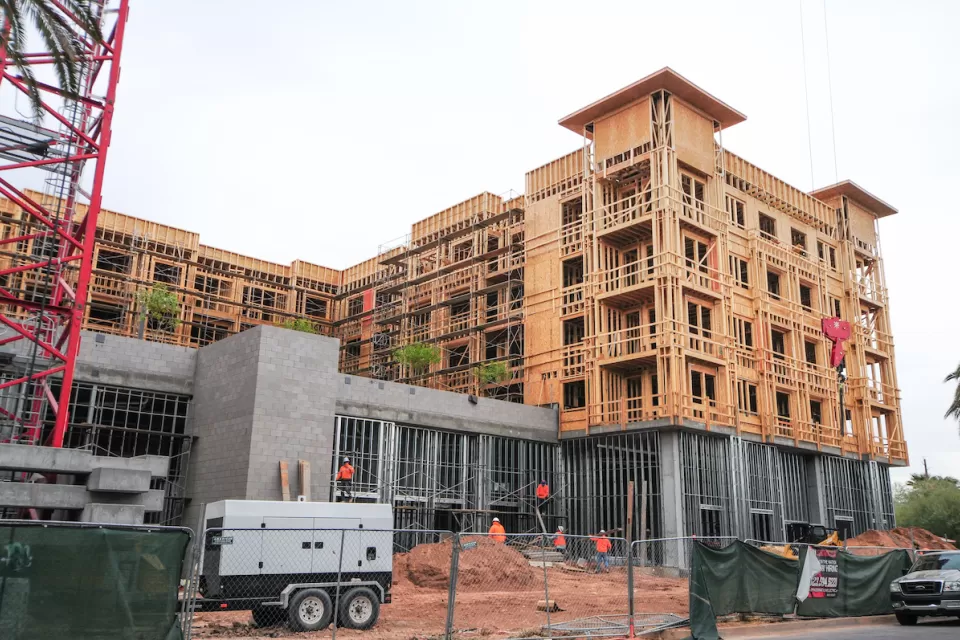 Five-story apartment building under construction.